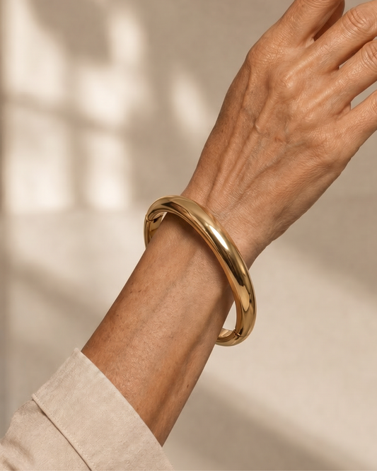 BRAZALETE RÍGIDO DORADO PULIDO