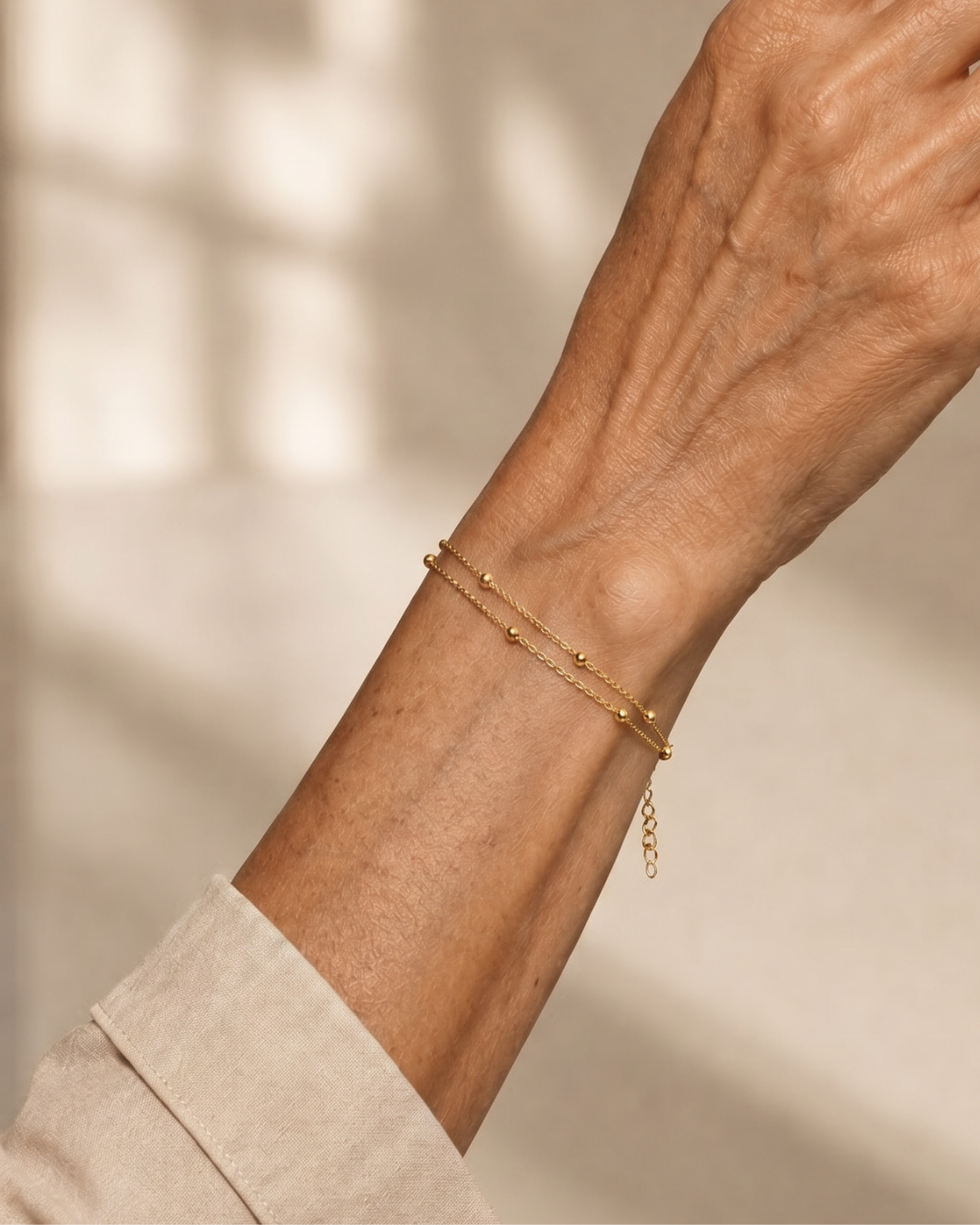 PULSERA CADENA SATÉLITE DORADA