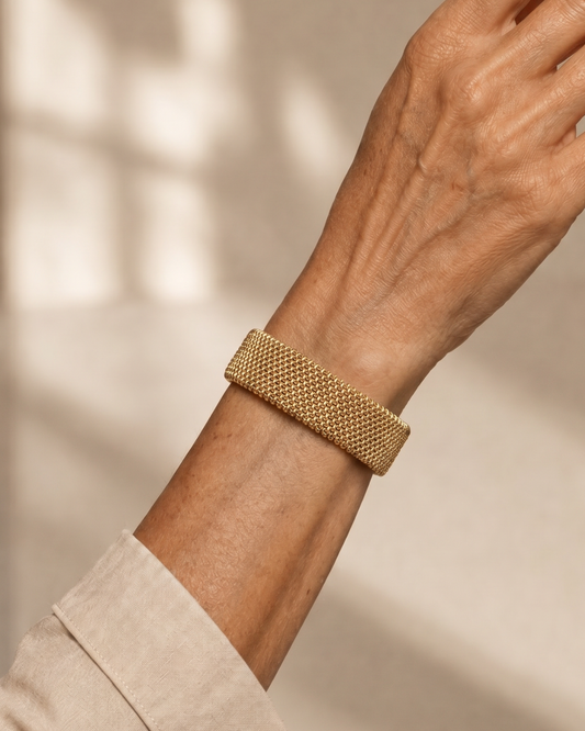 BRAZALETE MALLA TEJIDA DORADA