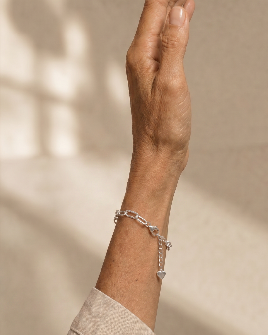 PULSERA CADENA DOBLE PLATEADA CON DIJE ROMBO
