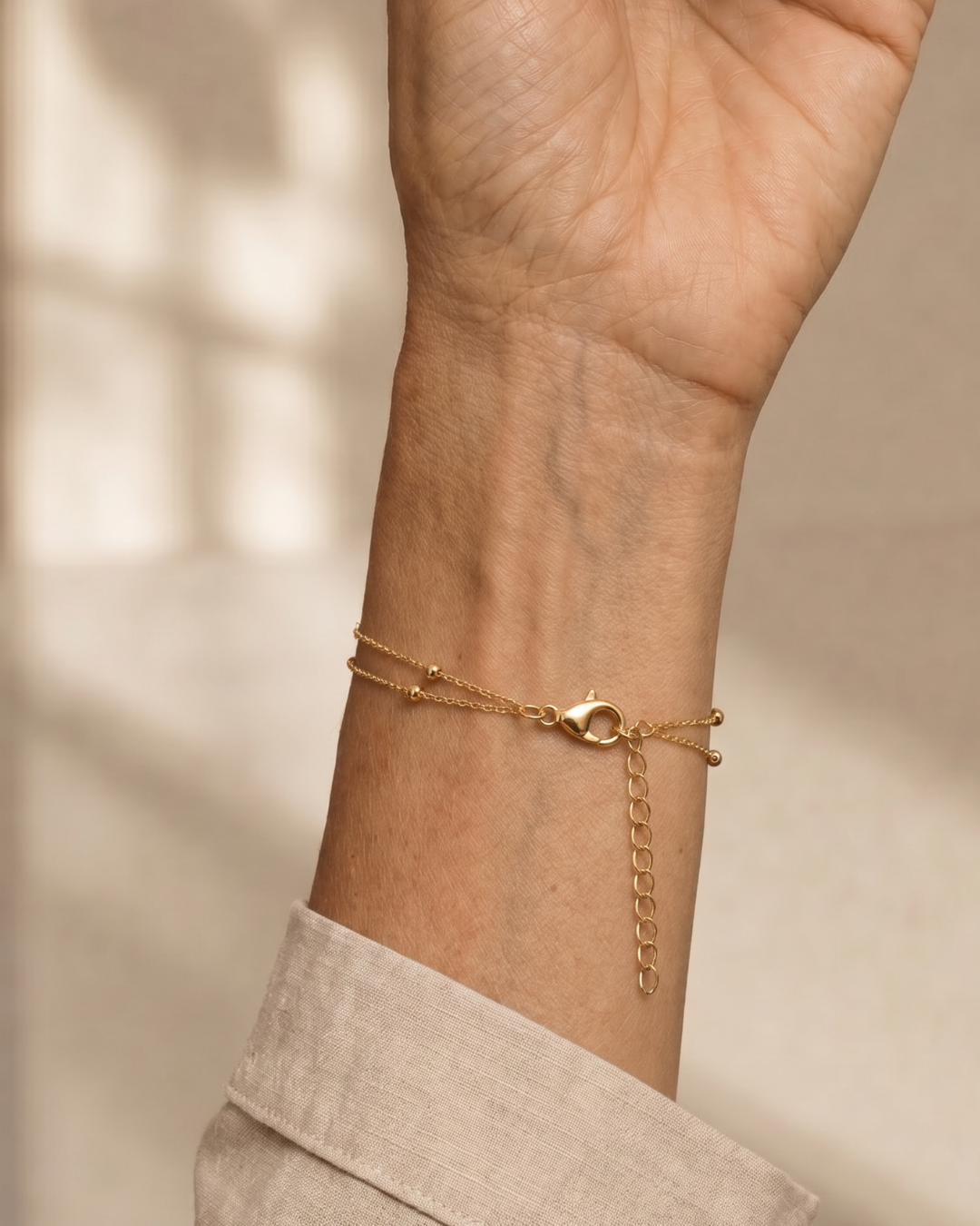 PULSERA CADENA SATÉLITE DORADA