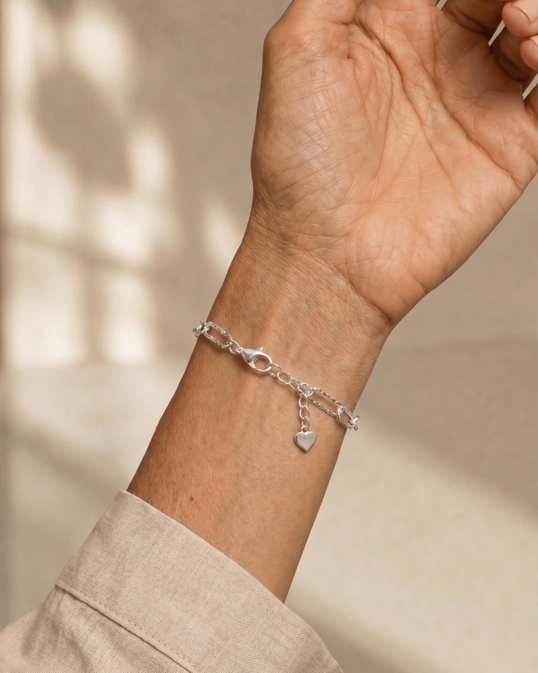 PULSERA CADENA DOBLE PLATEADA CON DIJE ROMBO