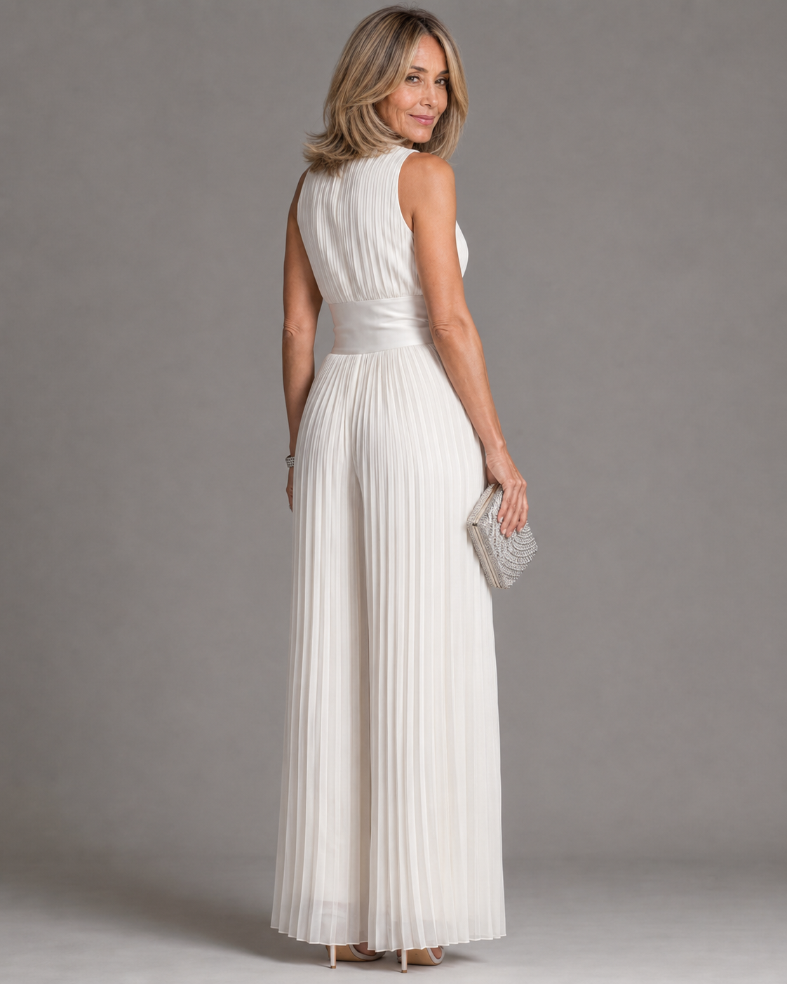 AURORA | MONO PLISADO DE CUELLO HALTER Y PIERNA ANCHA