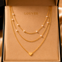 COLLAR TRIPLE CAPAS CORAZÓN DORADO